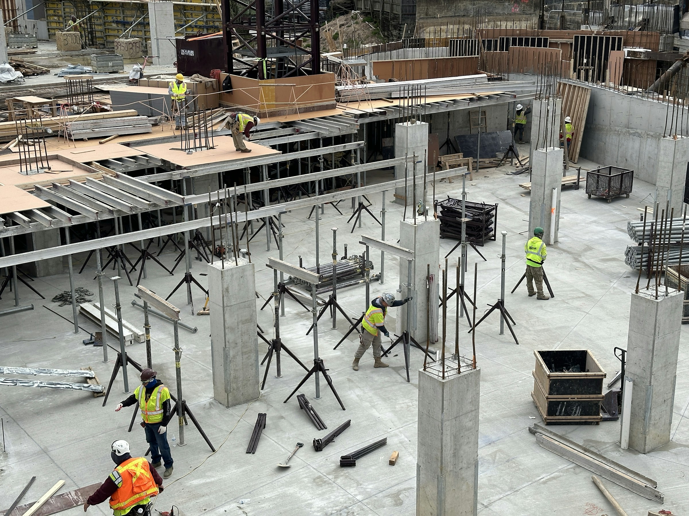 Construction crew working on a commercial building structure